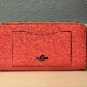 Coach pink accordion wallet